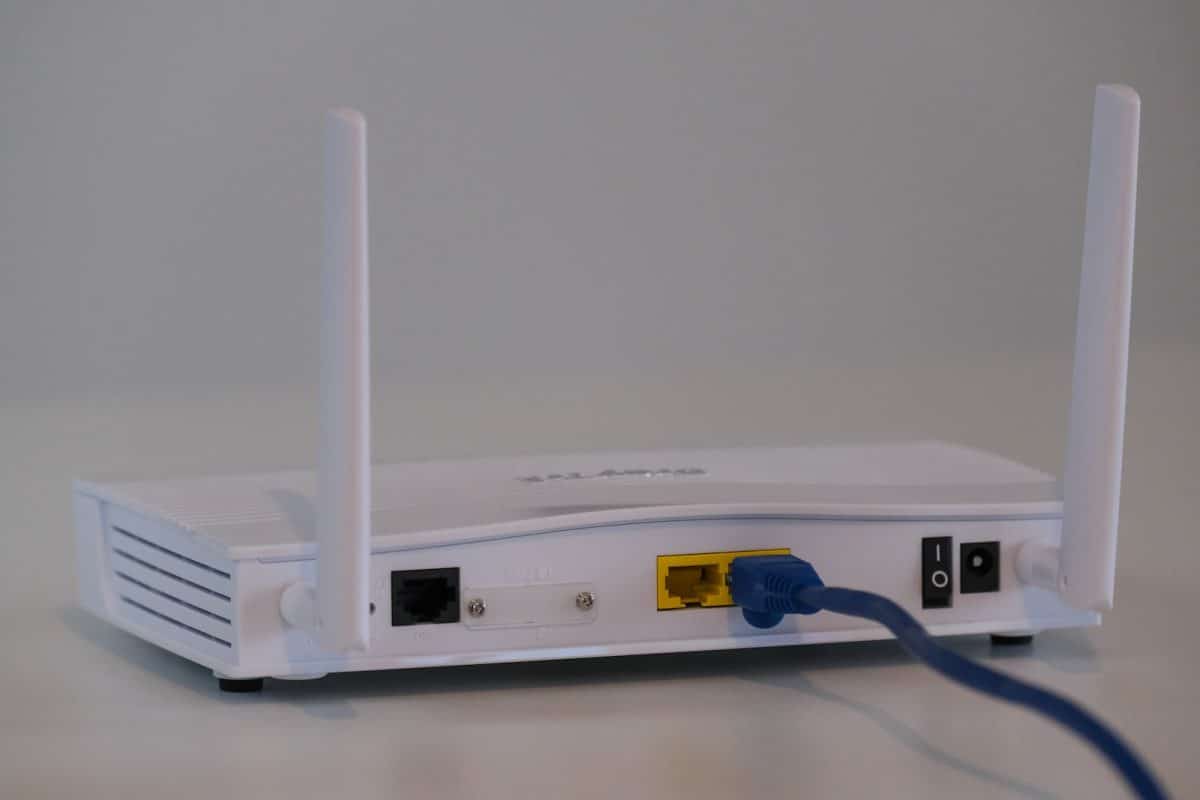 white router on white table